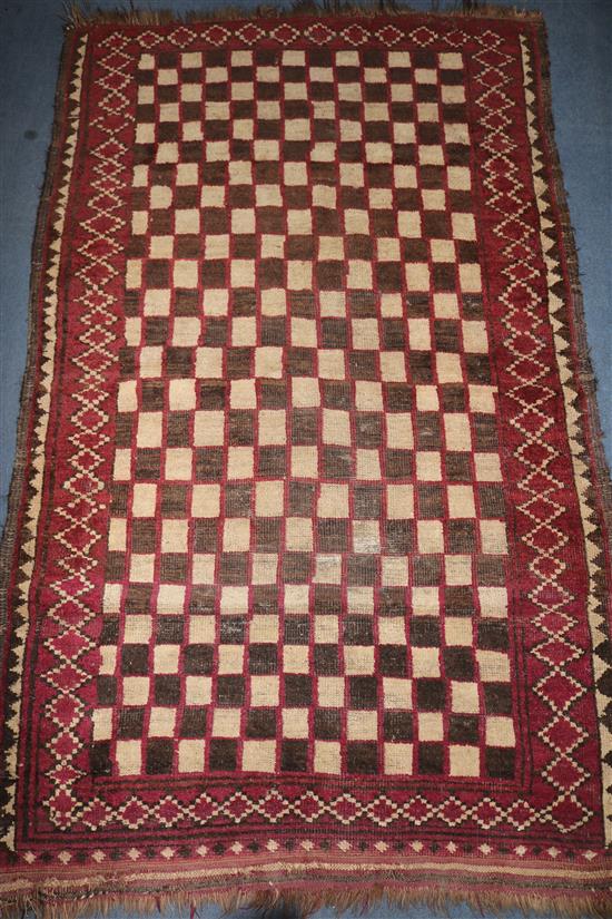 A Turkish rug 175 x 105cm